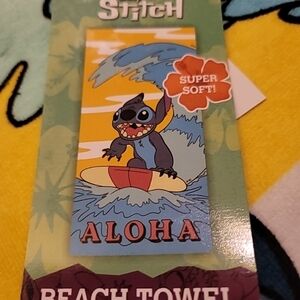 Stitch Beach towel. New with tags. 27x54